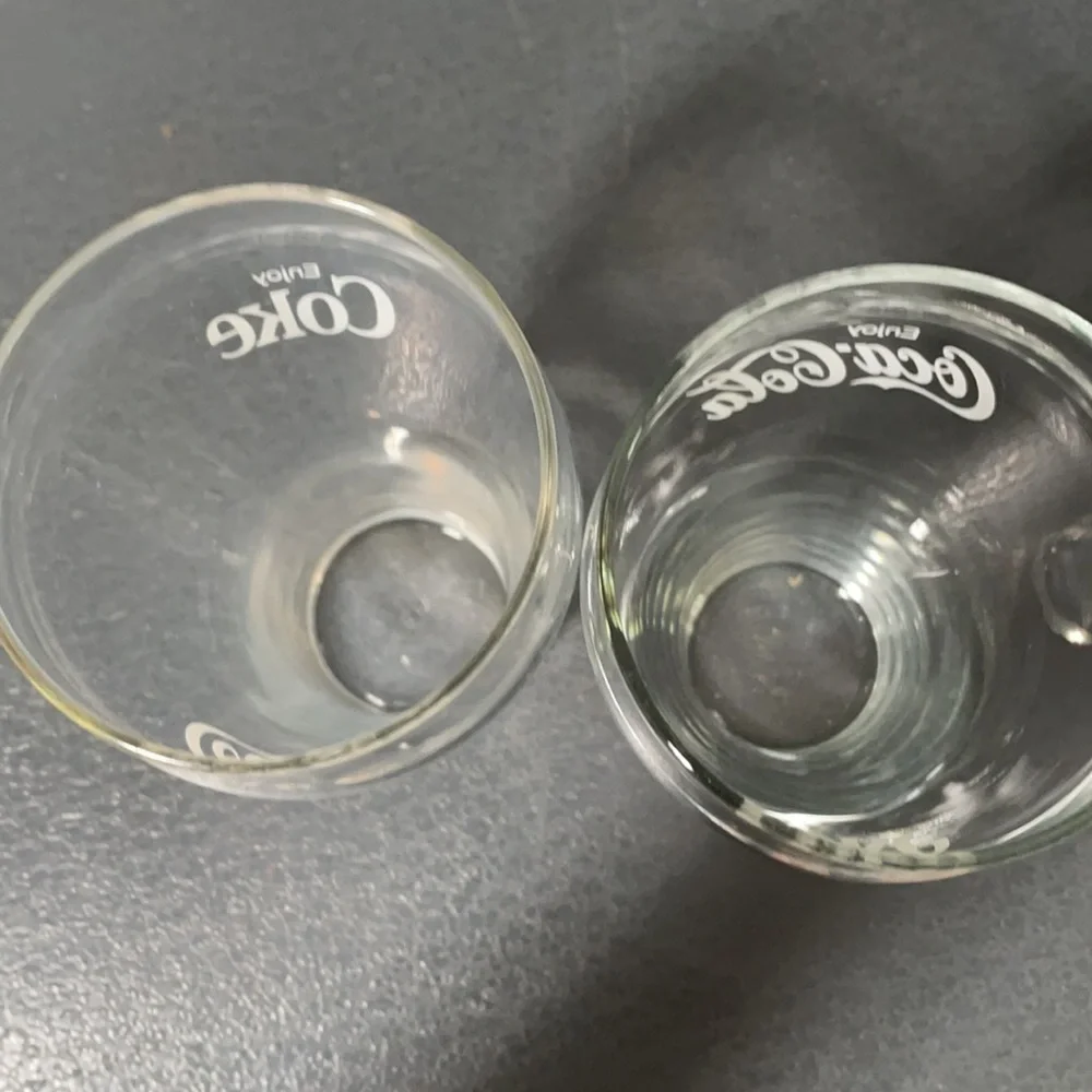 2 Coca Cola collectible glasses
